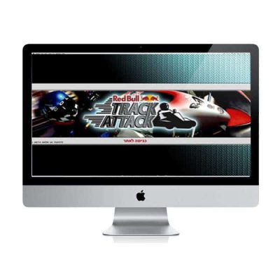 עיצוב אתר – עמוד Red Bull Track Attack על מסך iMac, קארטינג ורוכב בקסדה על רקע שחור וטורקיז | פורטפוליו קרנף סטודיו